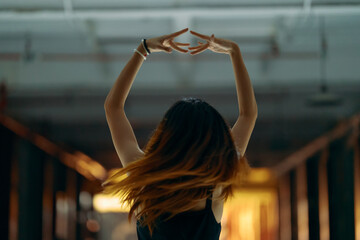 real young woman releases pressure through free dancing