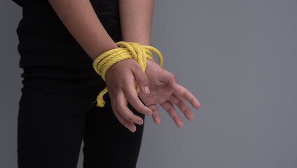 Child's hands tied with rope ,kidnapping concept