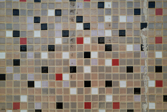 Vintage wall of tiny mosaic tiles