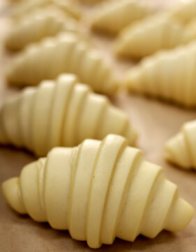 Row of croissants on the table