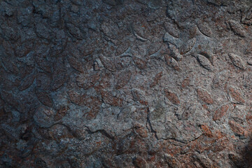 Old dark burnt metal surface, rusty texture, background corrosion