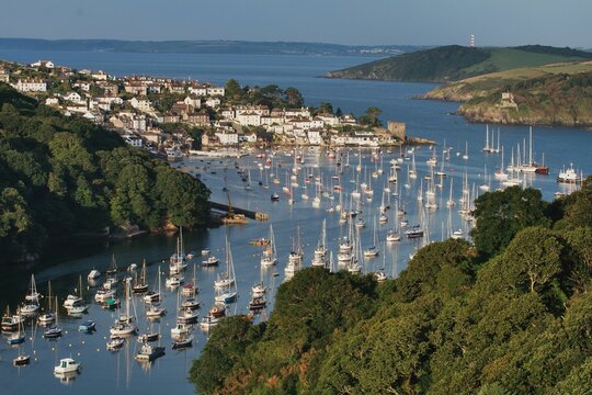 A vast crowd of boats in an estuary. 