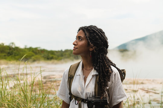 Arab backpacker admiring nature in reserve