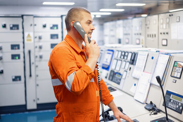 officer calling from phone in engine control room