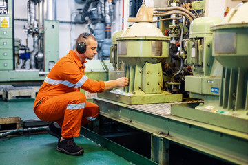 engineer in engine room checks work separator