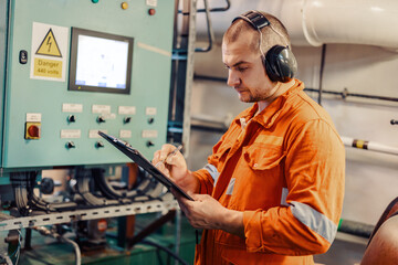 seaman doing inspection with checklist