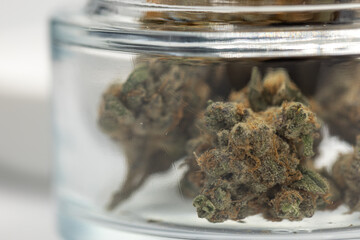close up of weed in a jar