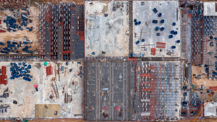 Aerial view construction site with tower crane and building construction site, Construction sites and many cranes and heavy construction working in the industry new building business.