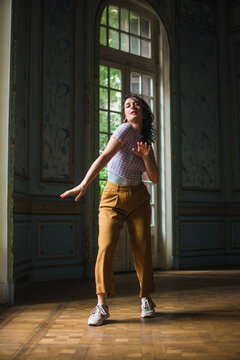 Girl dancing alone