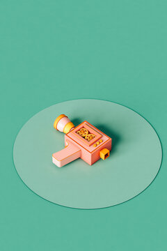 Super8 vintage camera. minimal flat lay design on green