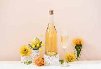 Champagne bottle still life with flowers