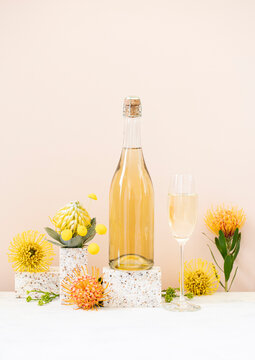 Champagne bottle still life with flowers