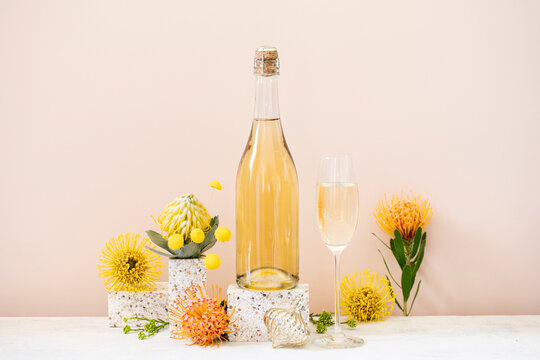 Champagne Christmas decoration still life with flowers