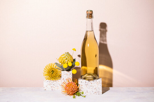 Champagne bottle still life with flowers