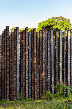 Steel pilings with numbers at bridge construction site