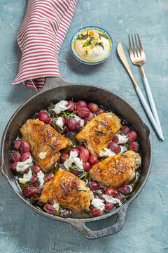 Pan roasted chicken thighs rosemary and red grapes