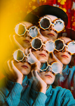 Fototapeta Expressive portrait of a girl in vintage sunglasses, optical illusion, kaleidoscope.