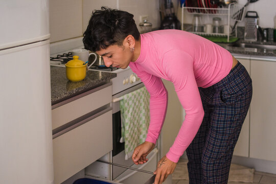Non binary person house chores
