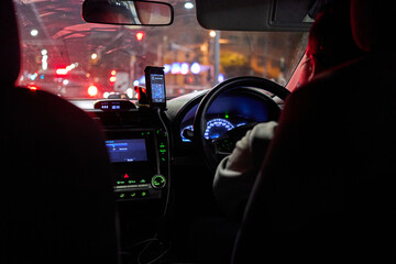 Rideshare driver at night
