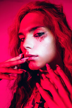 Transgender portrait in neon light