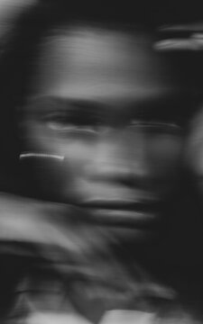 artistic female portrait with blur, beautiful woman