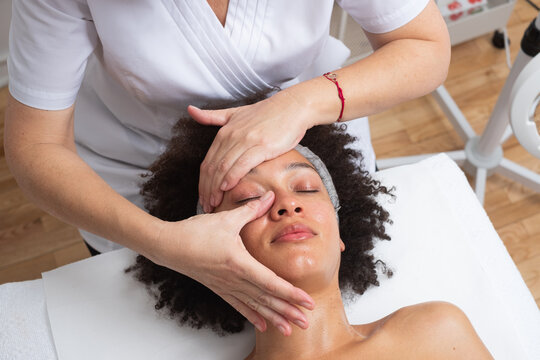 Woman Having A Face Massage At The Beauty Salon