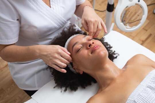 Woman Enjoying A Face Massage