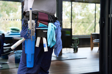 Tool belt with window cleaning tools