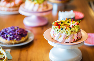 Wooden table with delicious cakes and pies.
