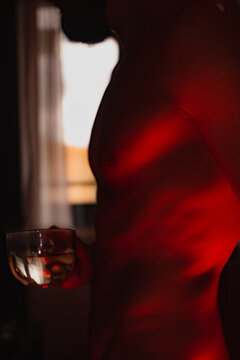 Shirtless Man Drink At Home Alone