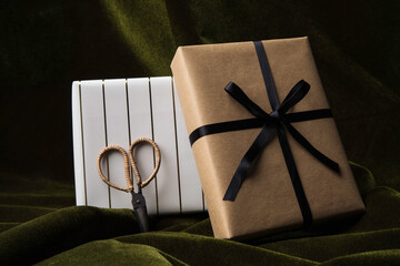 Holiday wrapped boxes and scissors