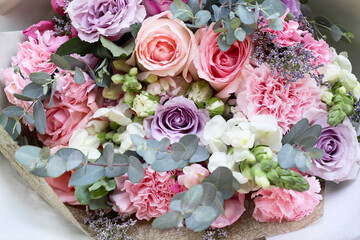 Close up rose carnation bouquet decorative with green leaf on background