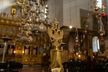 Russian gilded double-headed eagle at the top of the fence in the interior of the main hall of the Church of Nativity in Bethlehem in the Palestinian Authority, Israel