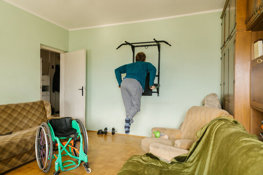 Disabled Man Doing Dips At Home