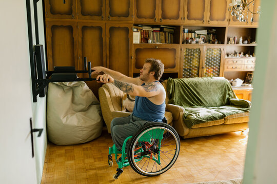 Man In A Wheelchair Exercising