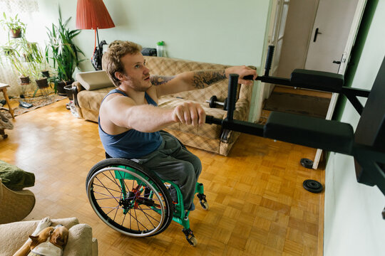 Physically Disabled Man Training At Home