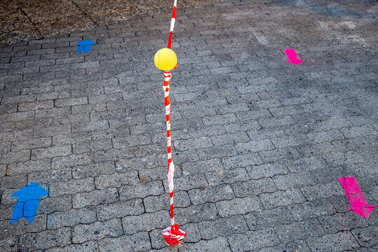 A barrier and arrows show the way