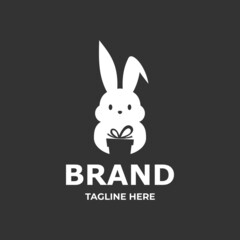 smart rabbit logo with gift box in negative style vector design template.
