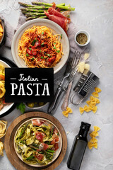 Pasta assortment on gray background.