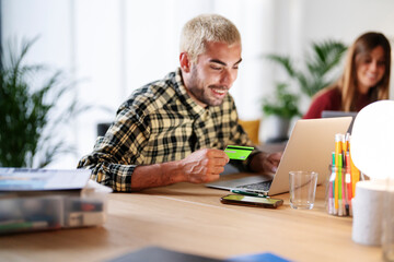 Man making online purchases during shopping