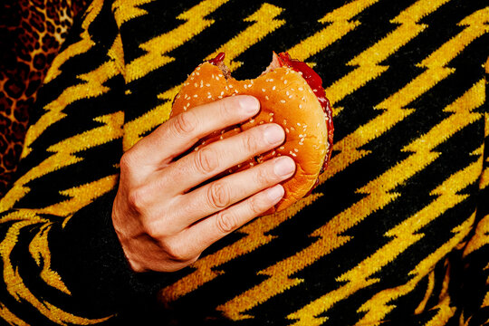 man eating a burger