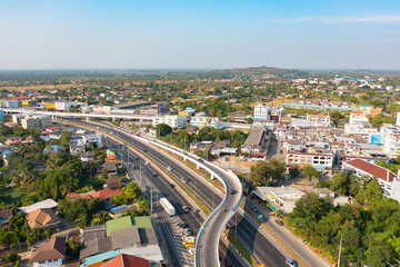 Fototapeta premium Aerial view of residential buildings, Ratchaburi skyline, Thailand. Urban city in Asia. Architecture landscape background.