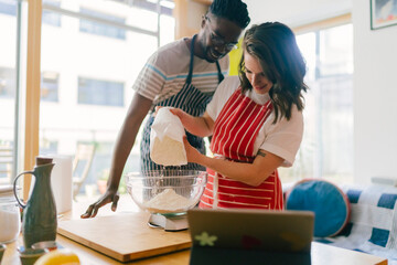 A couple Cooks Together at Home