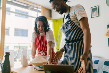 A couple Cooks Together at Home