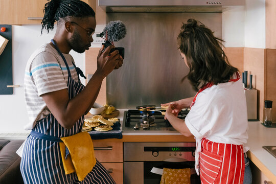 Couple of Influencers Cooking at Home