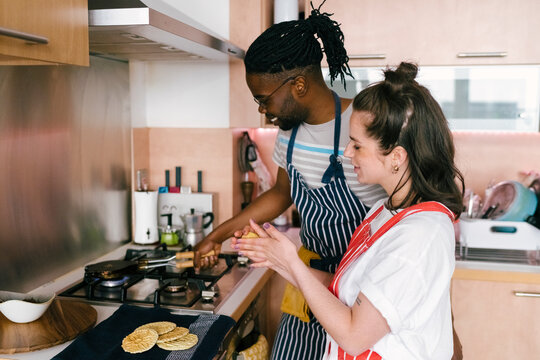 Young couple makes Homemade waffles
