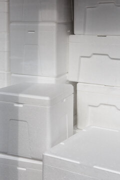 Styrofoam boxes piled up high.