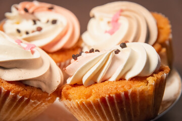 Cupcake (cup cake) close-up, baking fairy cake. Dessert.
