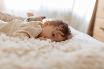 Baby Girl On Bed