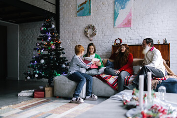 Girl taking gift and having fun during Christmas season